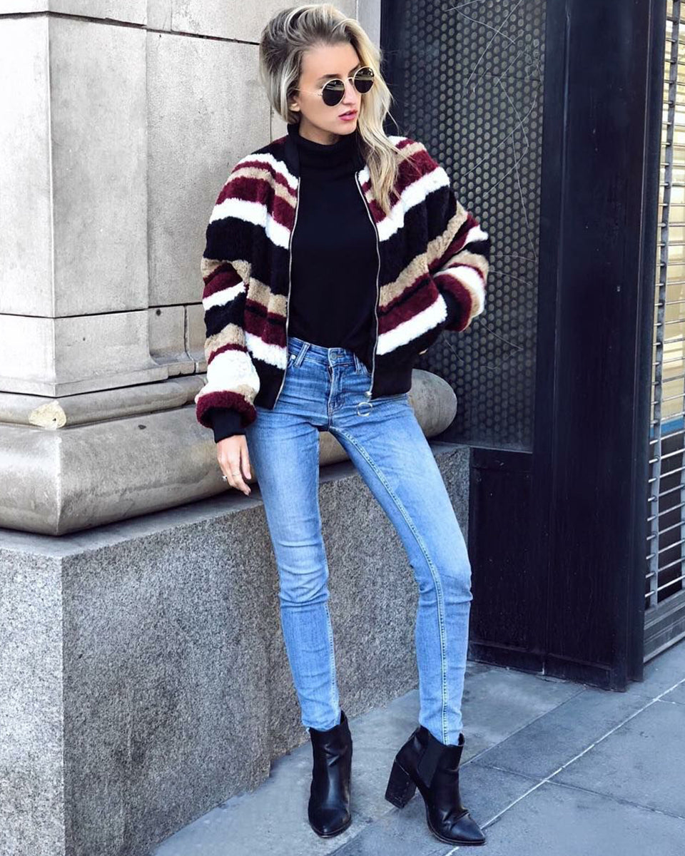 Samantha Lauren of What Would Kiki Wear in 525 America's Tulip Sleeve Turtleneck Sweater
