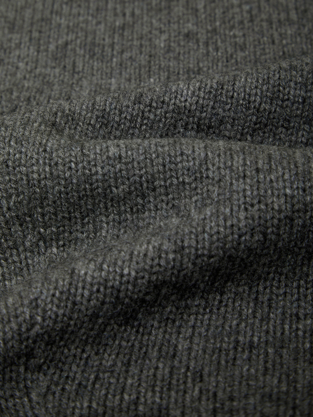 Close-up of dark gray textured fabric