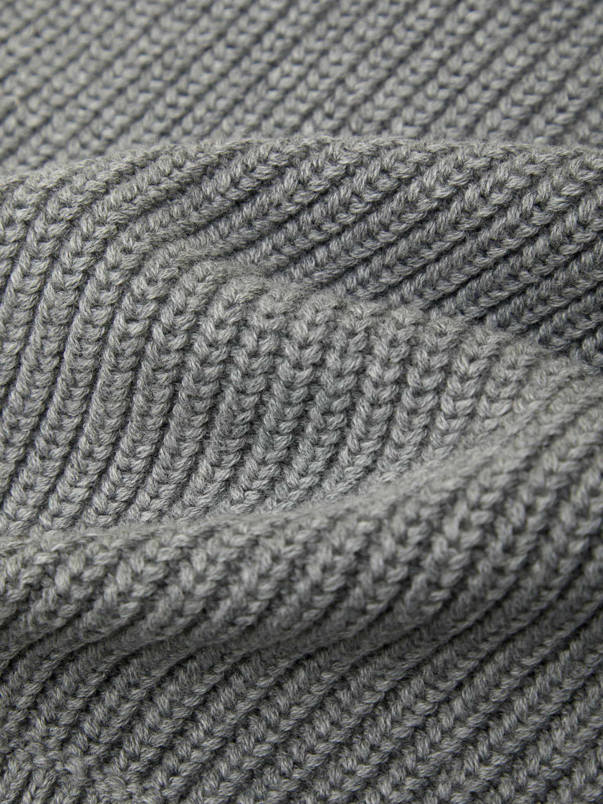 Close-up of gray knitted fabric texture