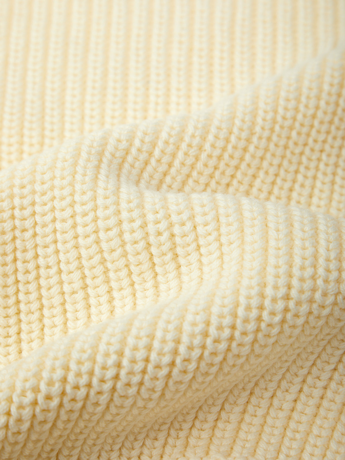 Close-up of beige textured fabric