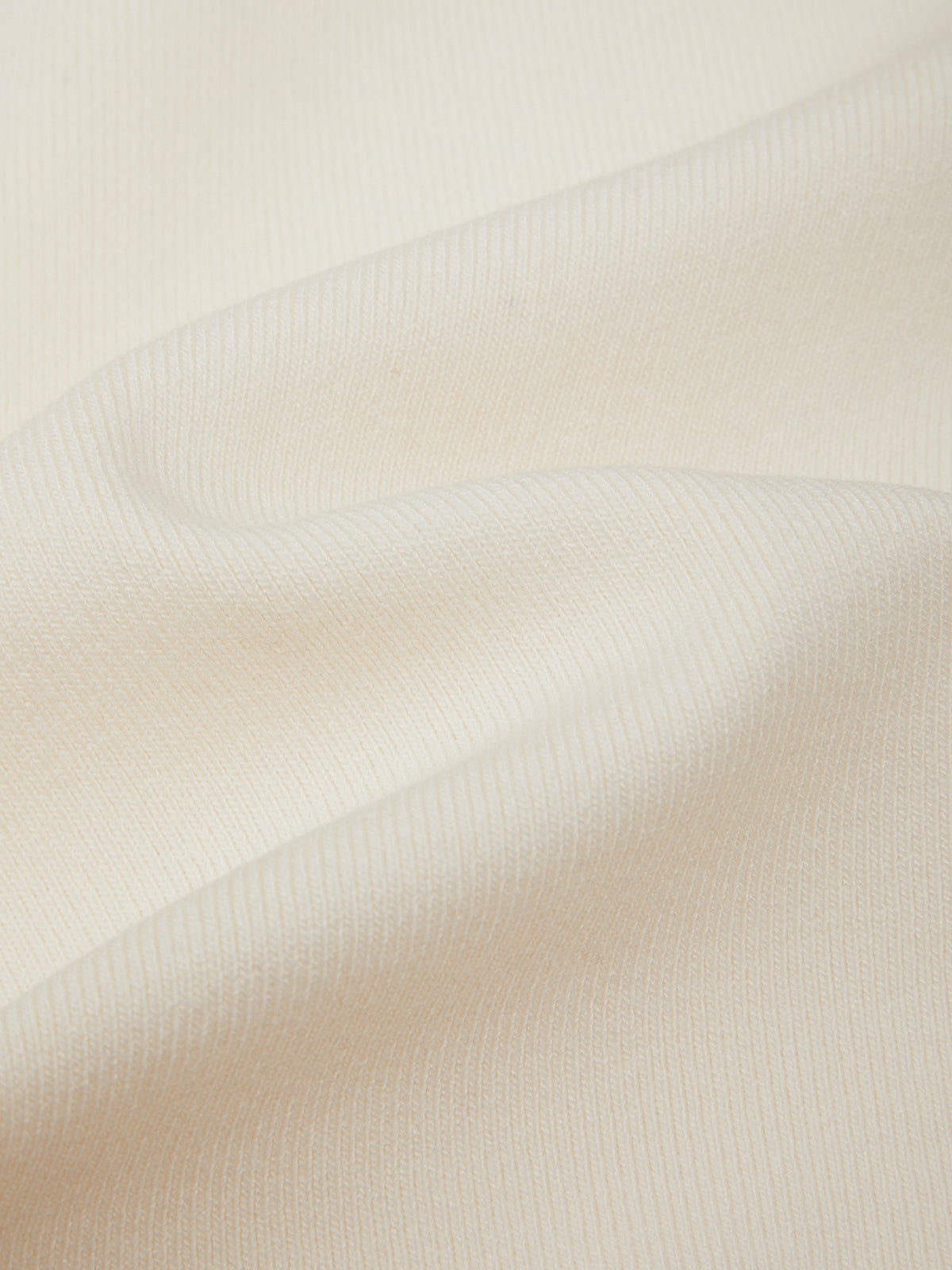 Close-up of beige fabric texture