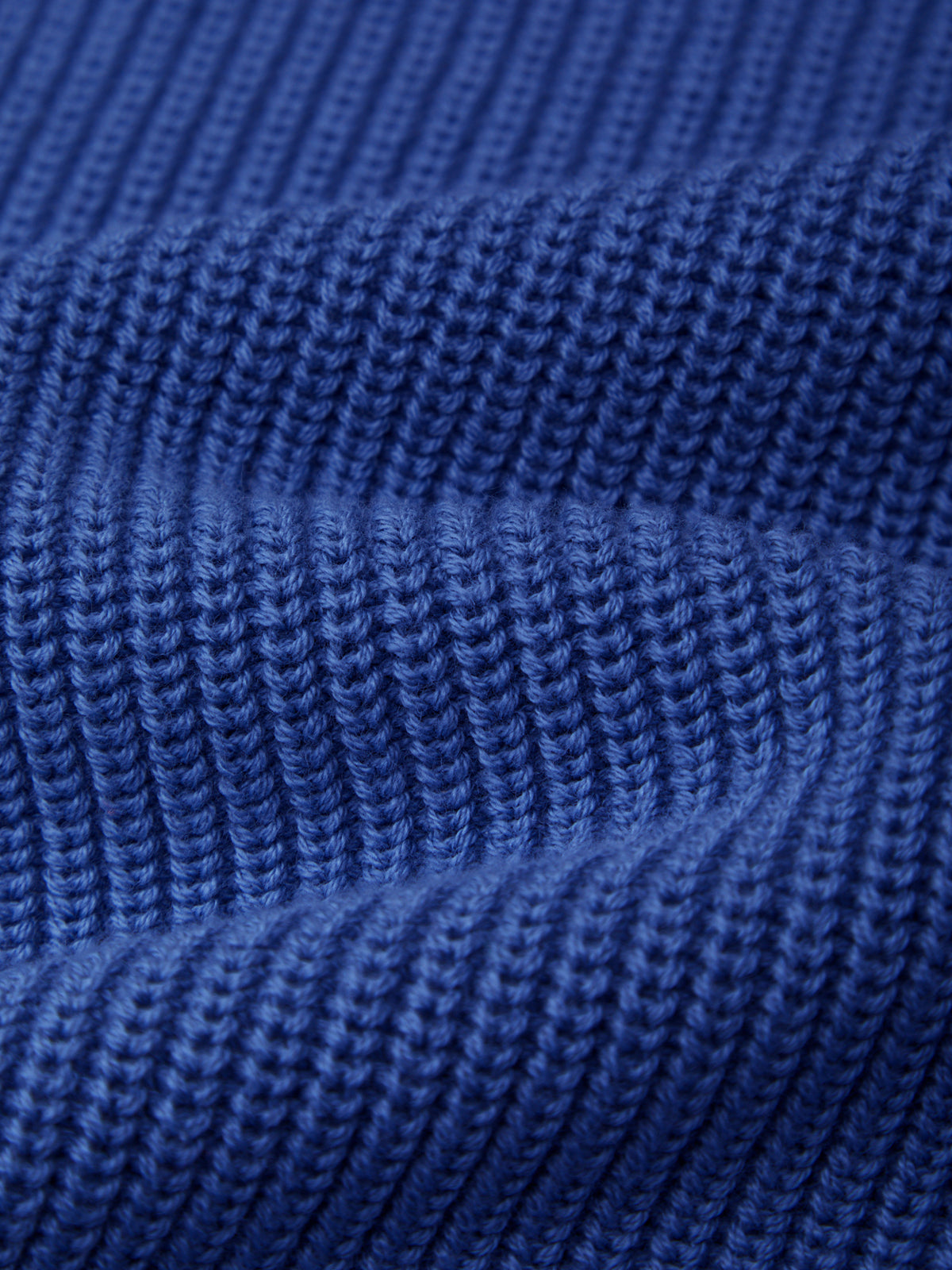 Close-up of blue knitted fabric texture
