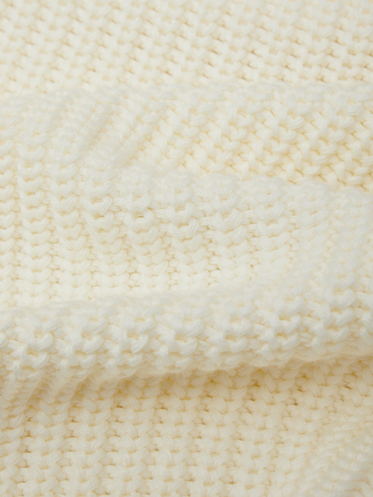 Close-up of beige fabric texture