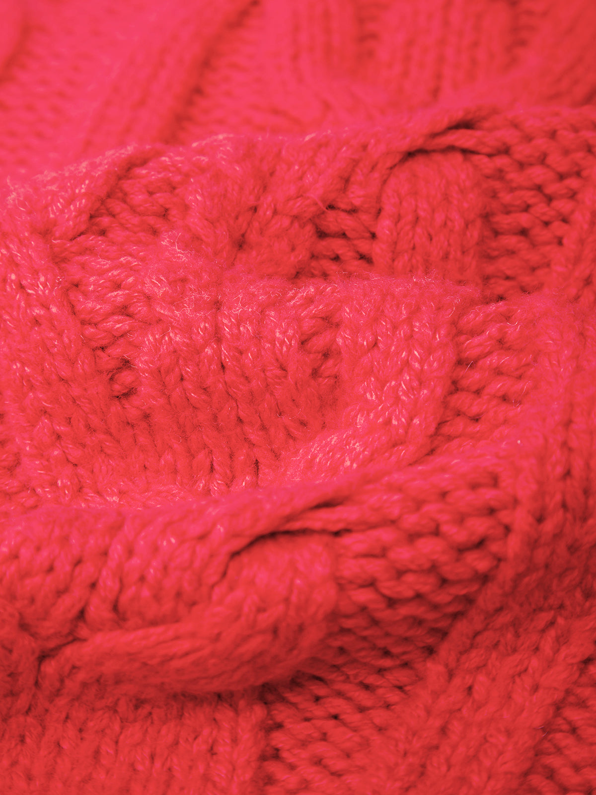 Close-up of bright pink knitted fabric