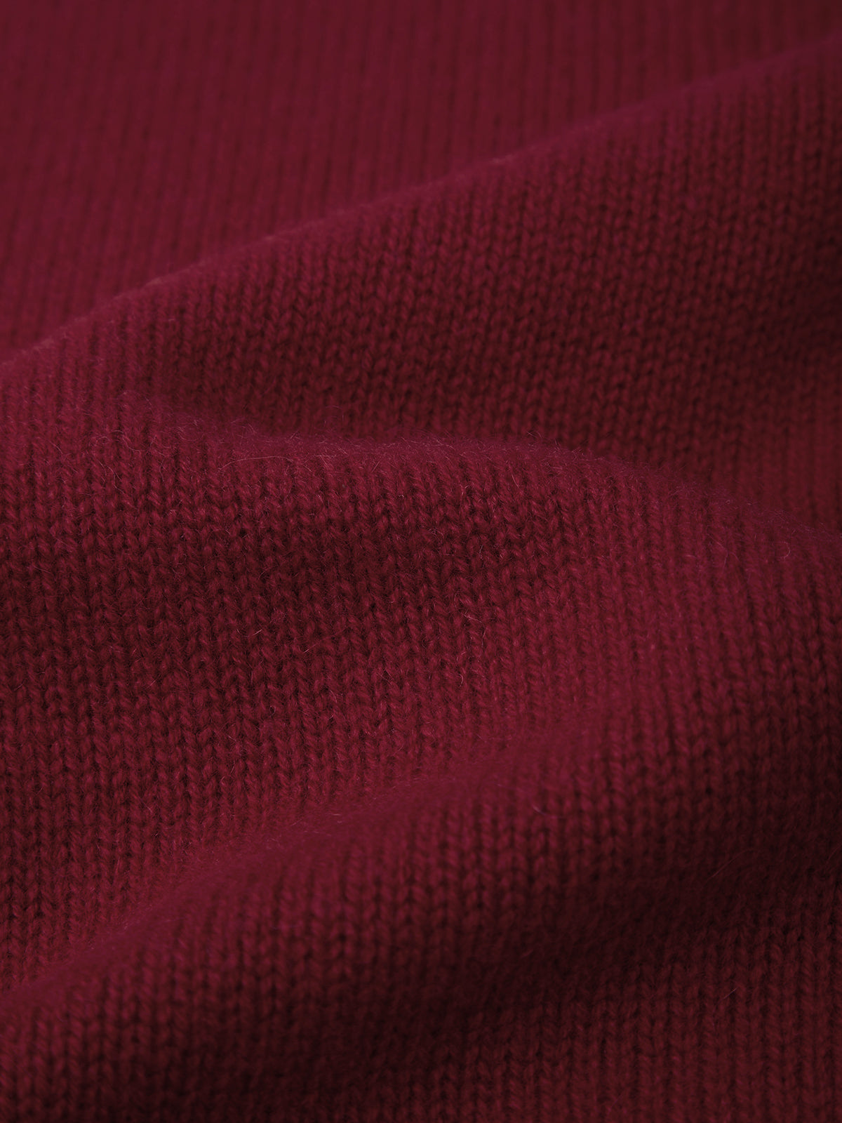 Close-up of textured burgundy fabric