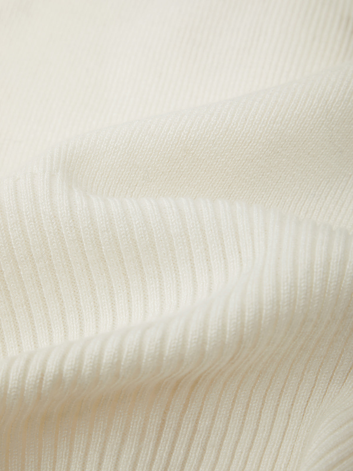 Close-up of textured white fabric
