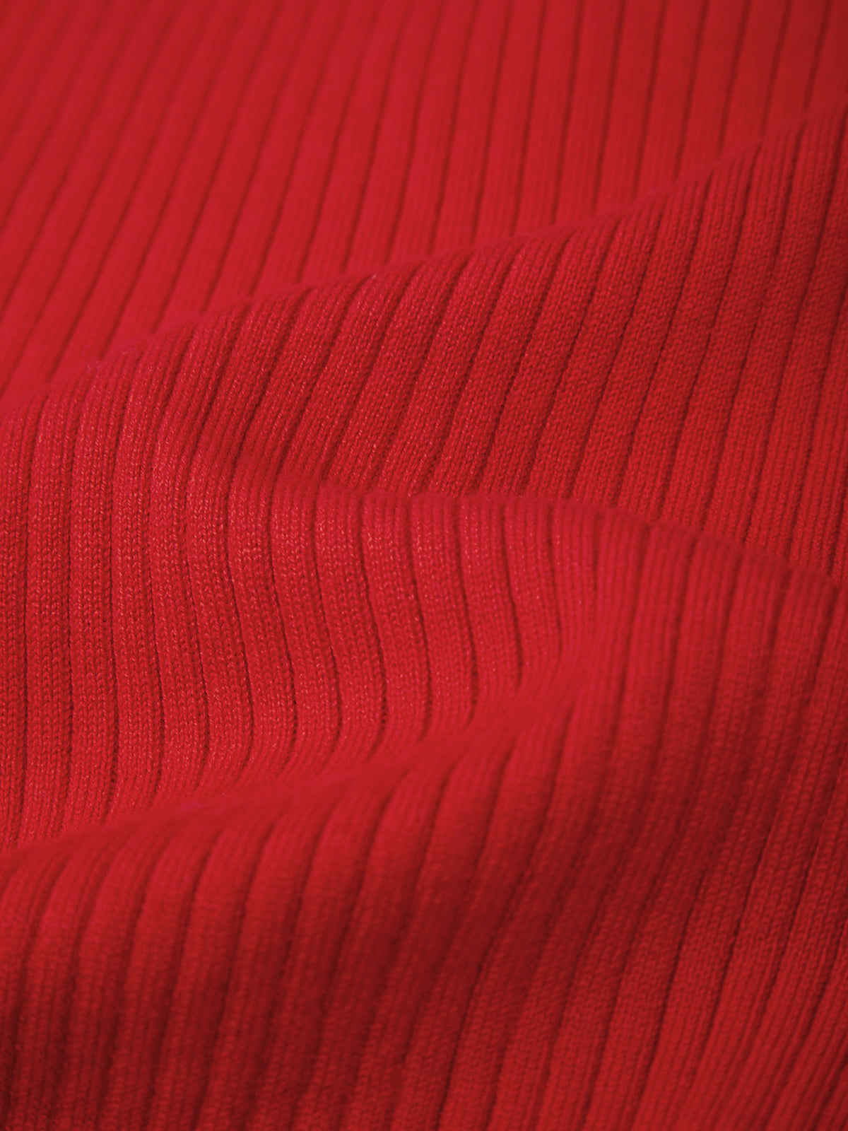 Close-up of red ribbed fabric texture