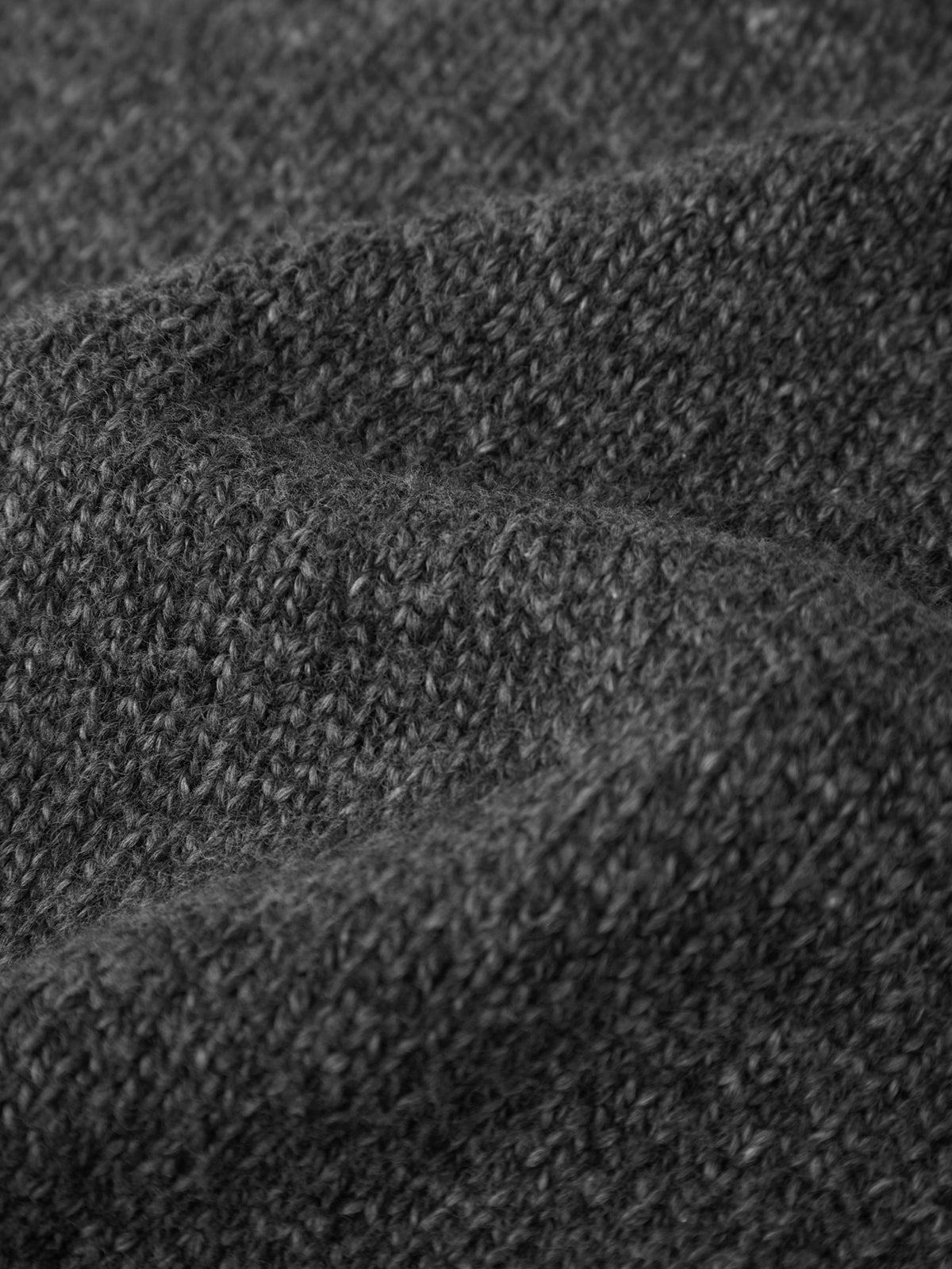 Close-up of dark gray fabric texture
