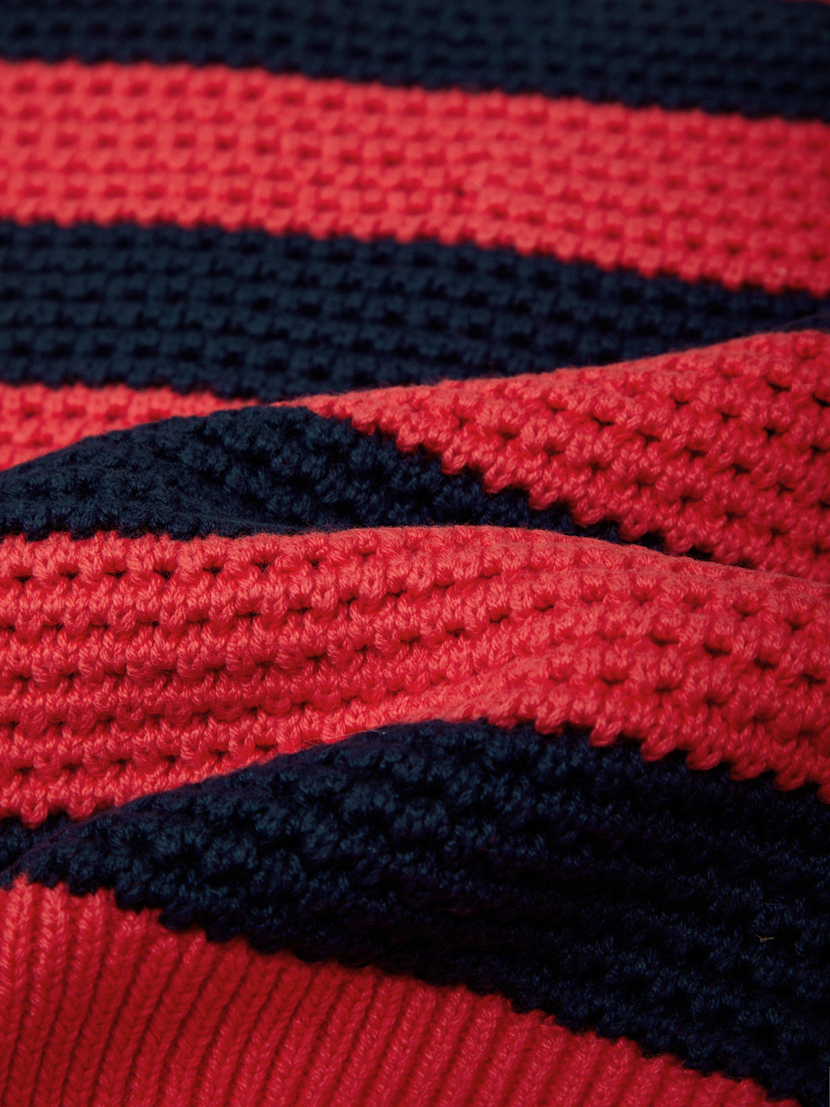 Close-up of red and navy striped fabric texture