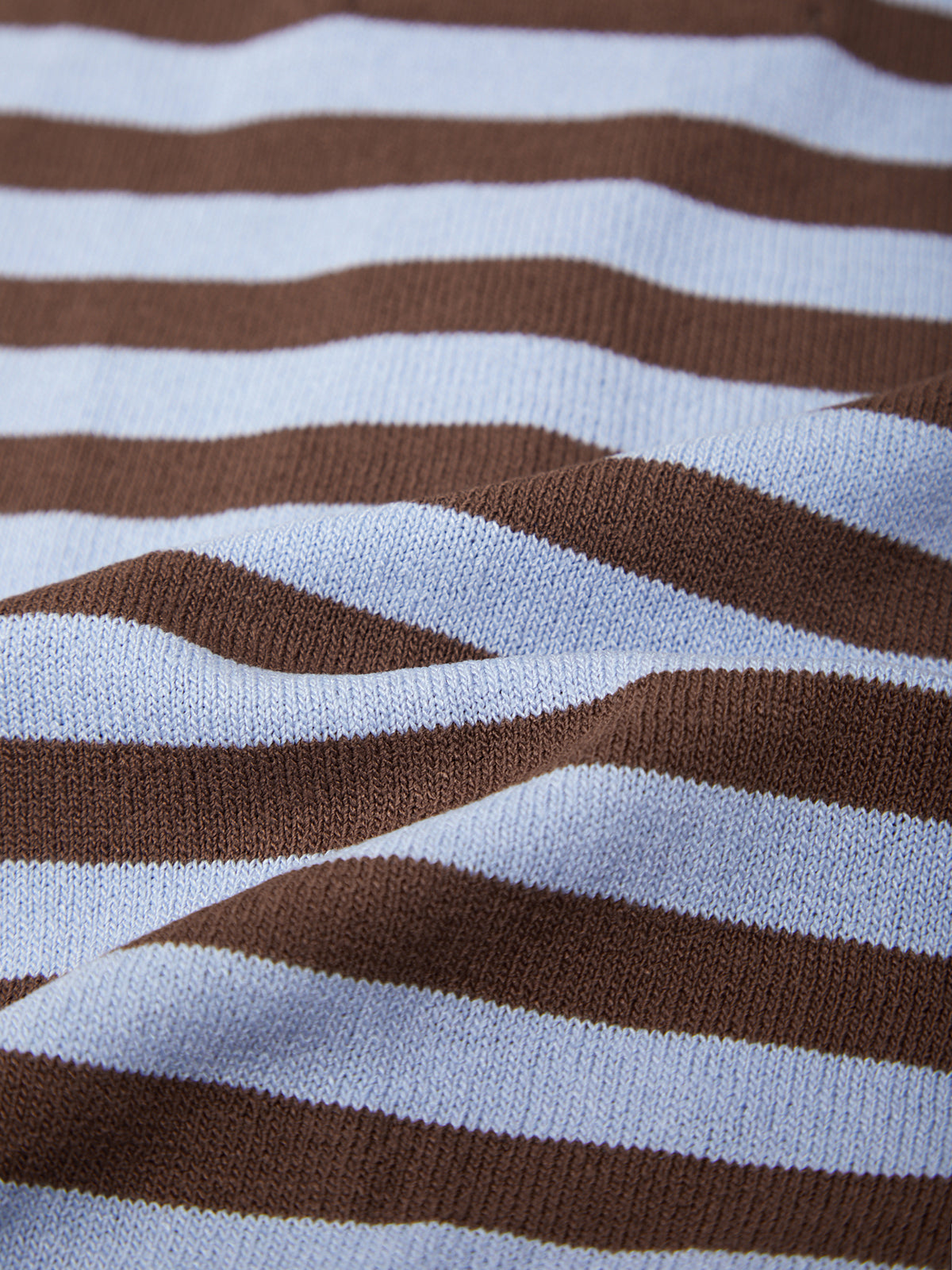 Close-up of brown and white striped fabric