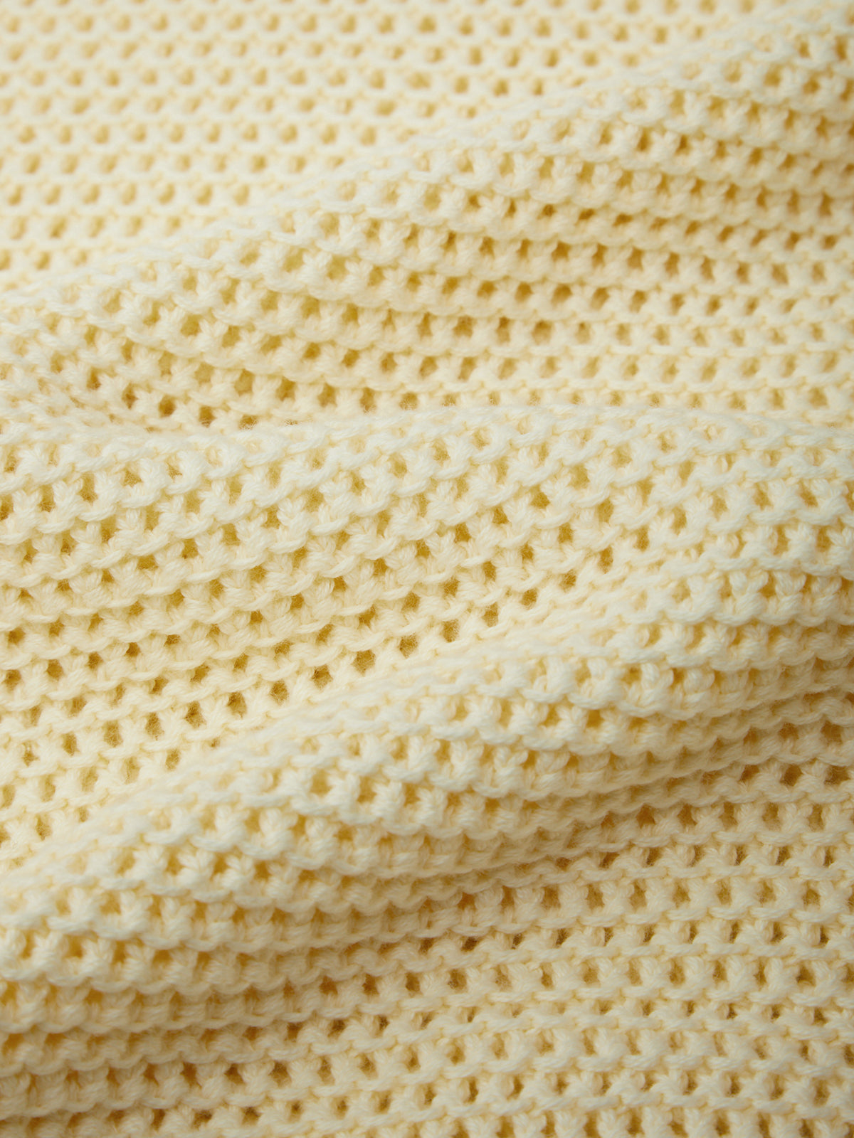 Close-up of beige textured fabric