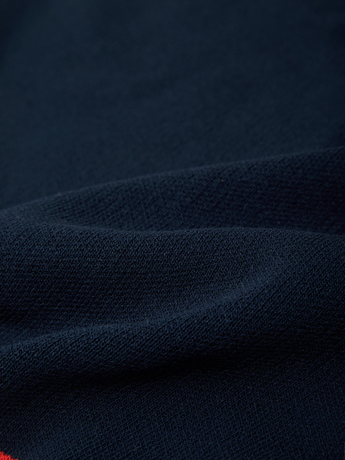 Close-up of dark blue fabric texture