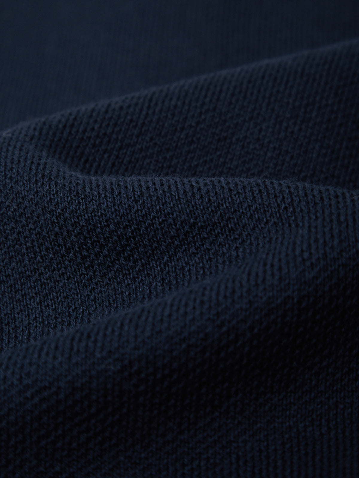 Close-up of dark blue fabric texture