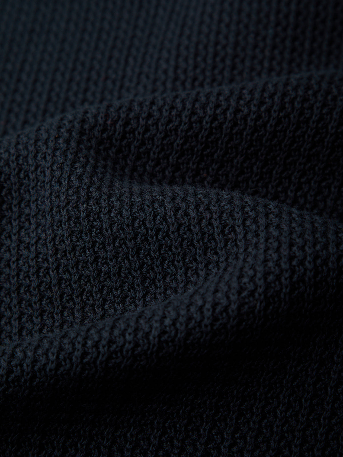 Close-up of dark blue textured fabric