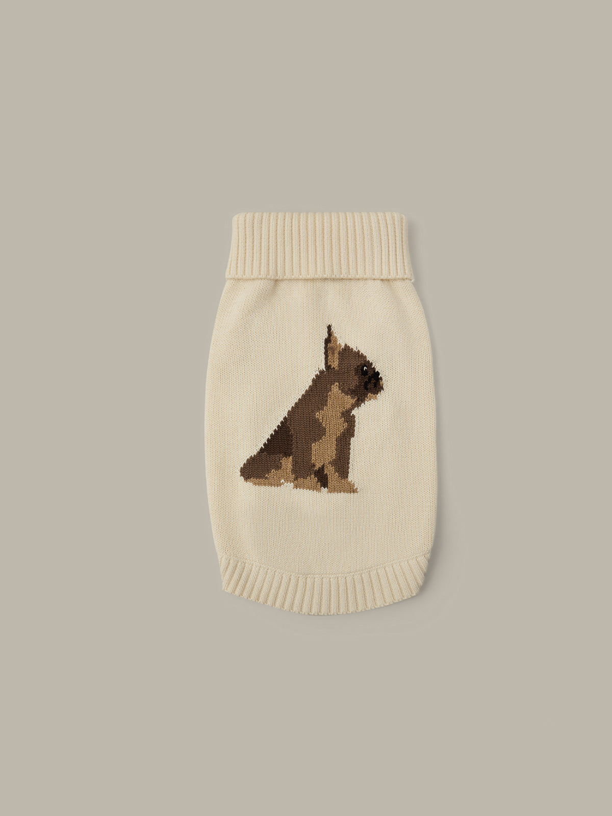 Beige knitted dog sweater with a brown bear design on a beige background