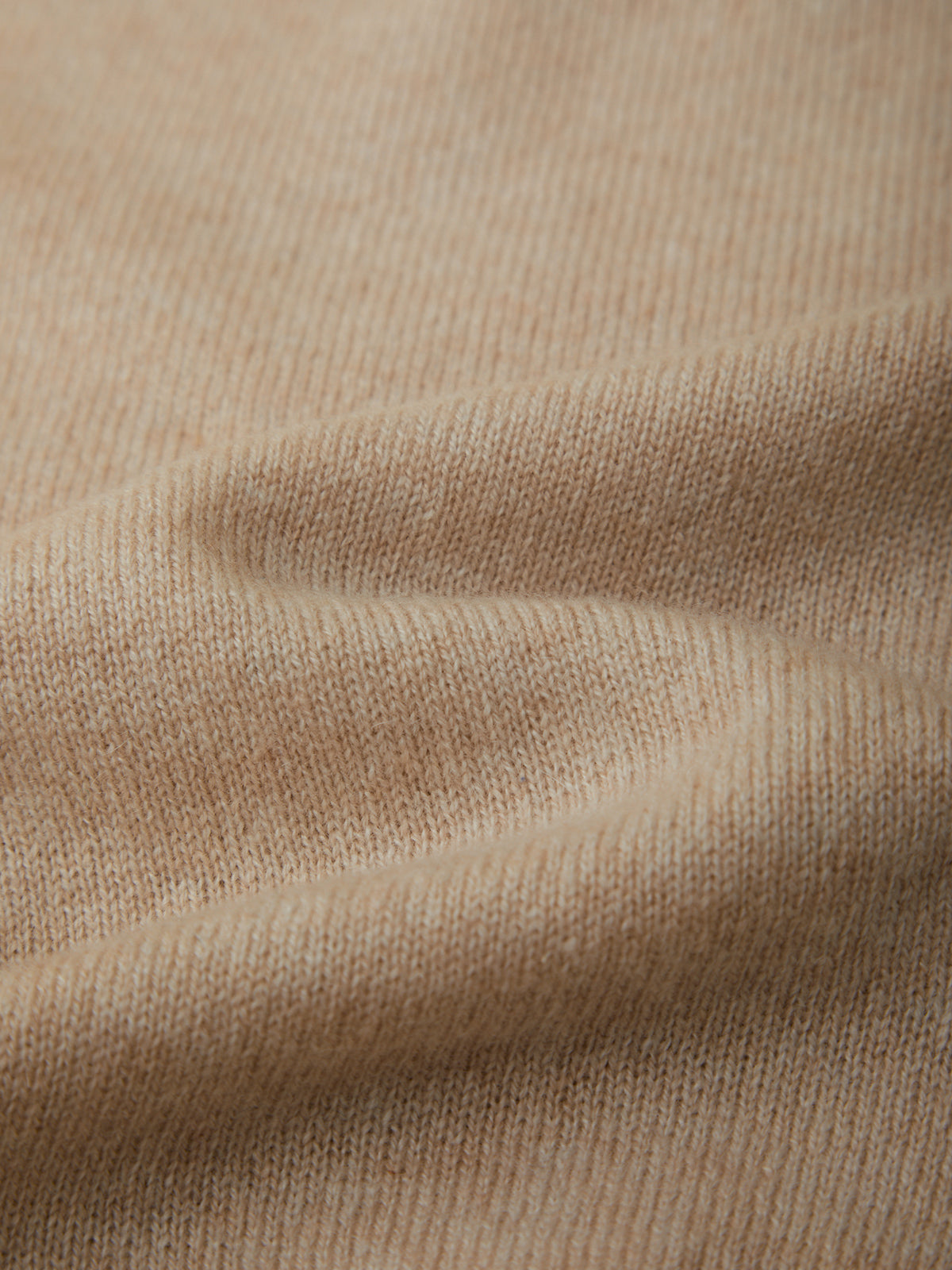 Close-up of beige fabric texture