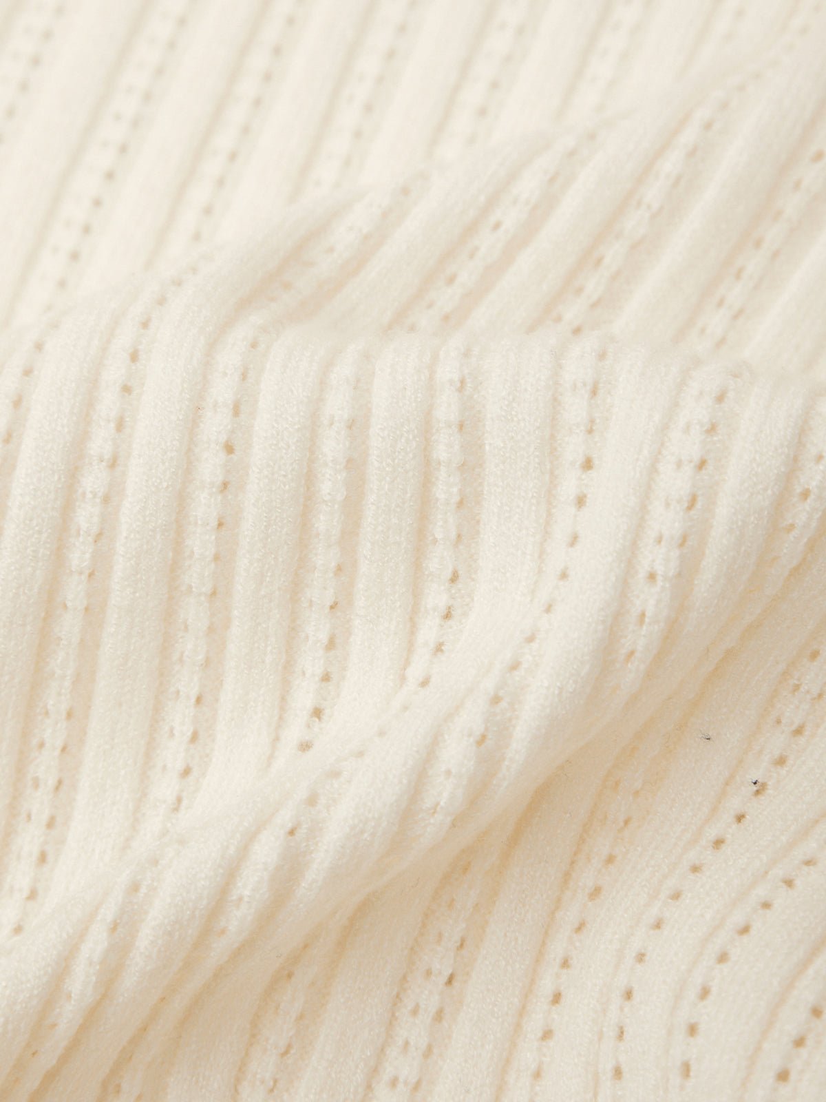 Close-up of beige fabric texture