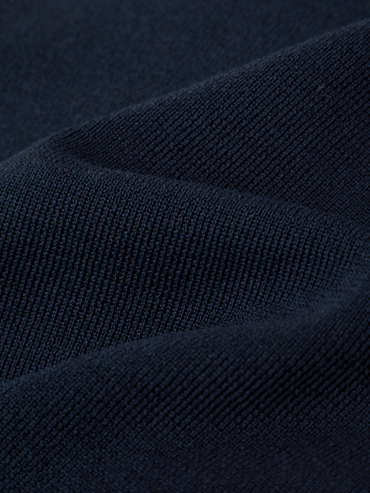 Close-up of dark blue fabric texture