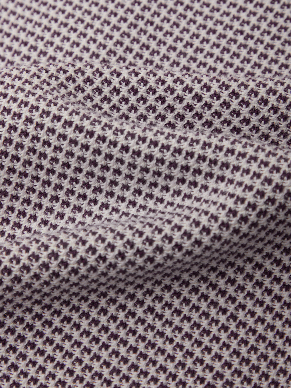 Close-up of a textured fabric with a subtle pattern