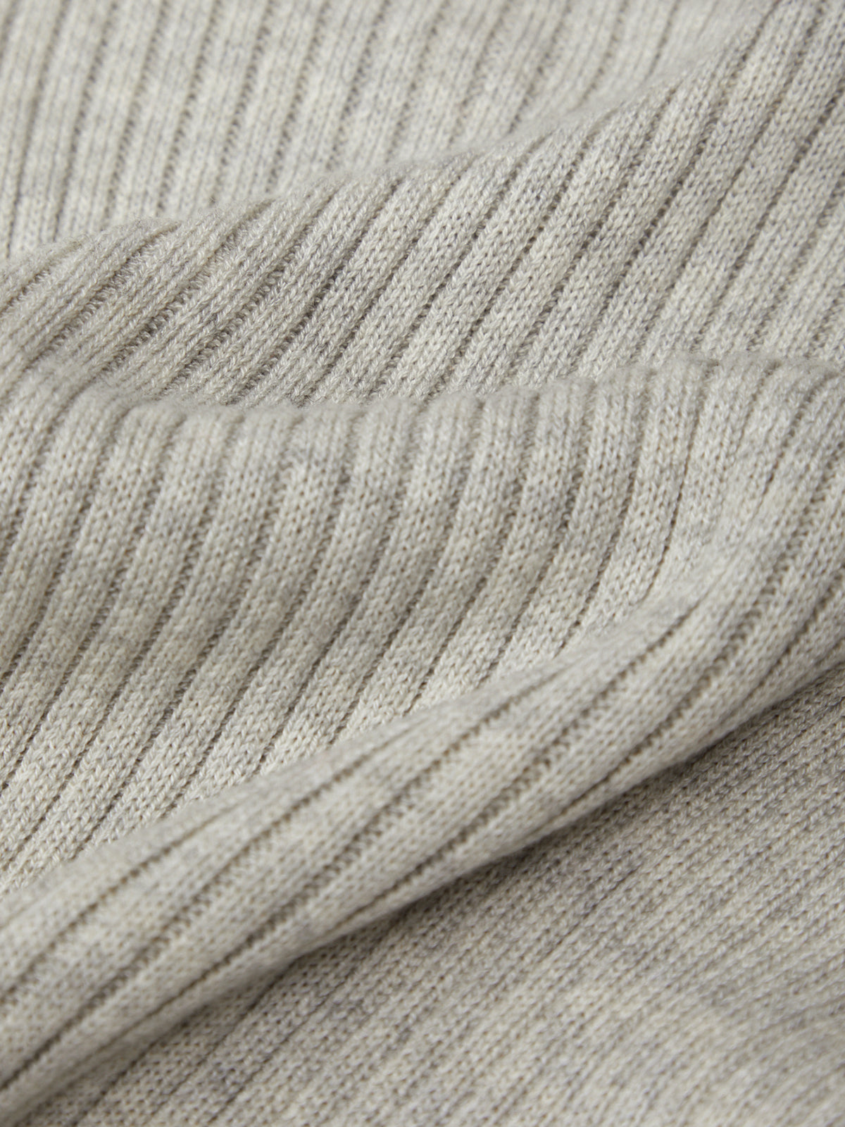 Close-up of gray knitted fabric texture