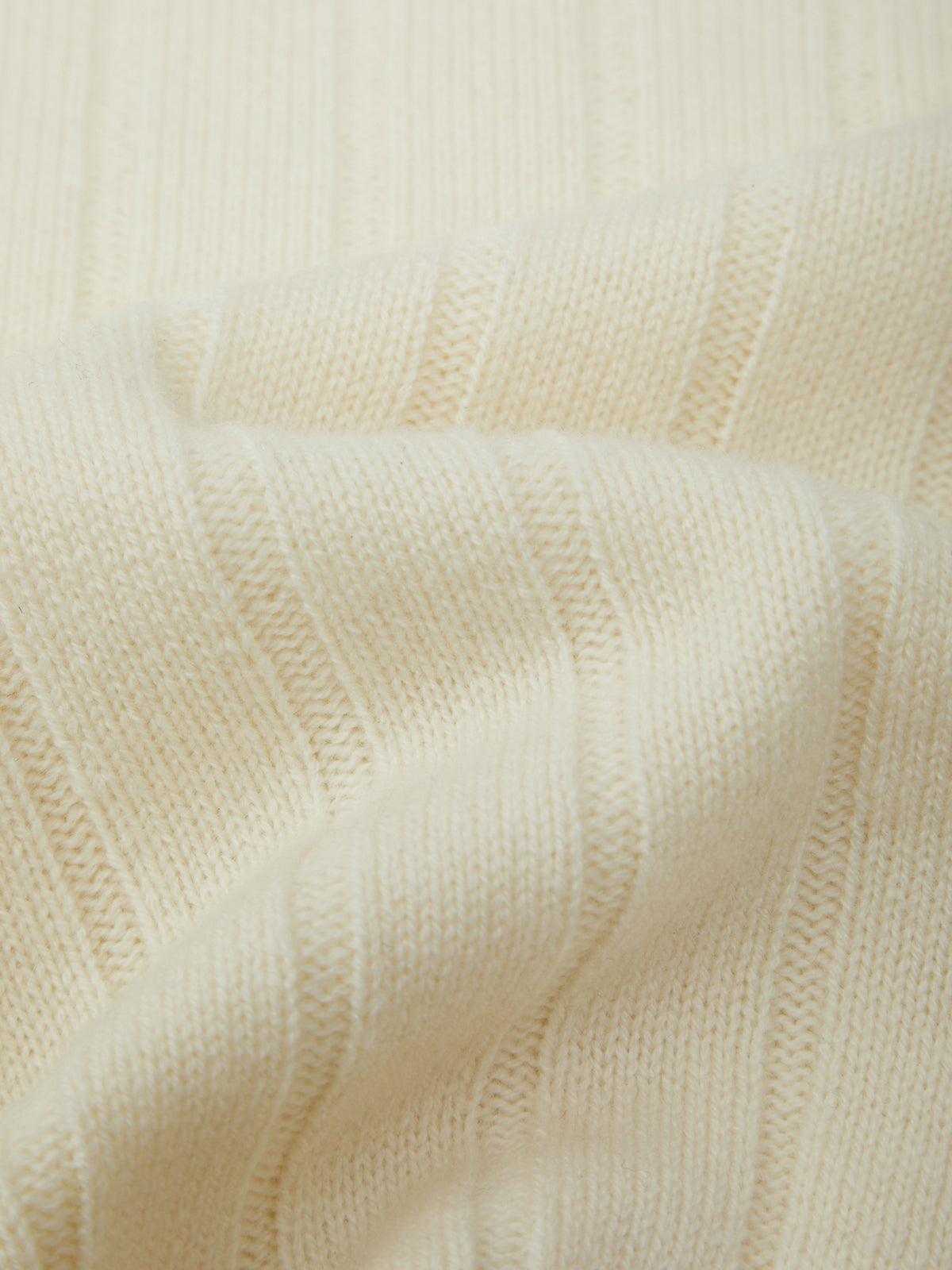 Close-up of textured beige fabric