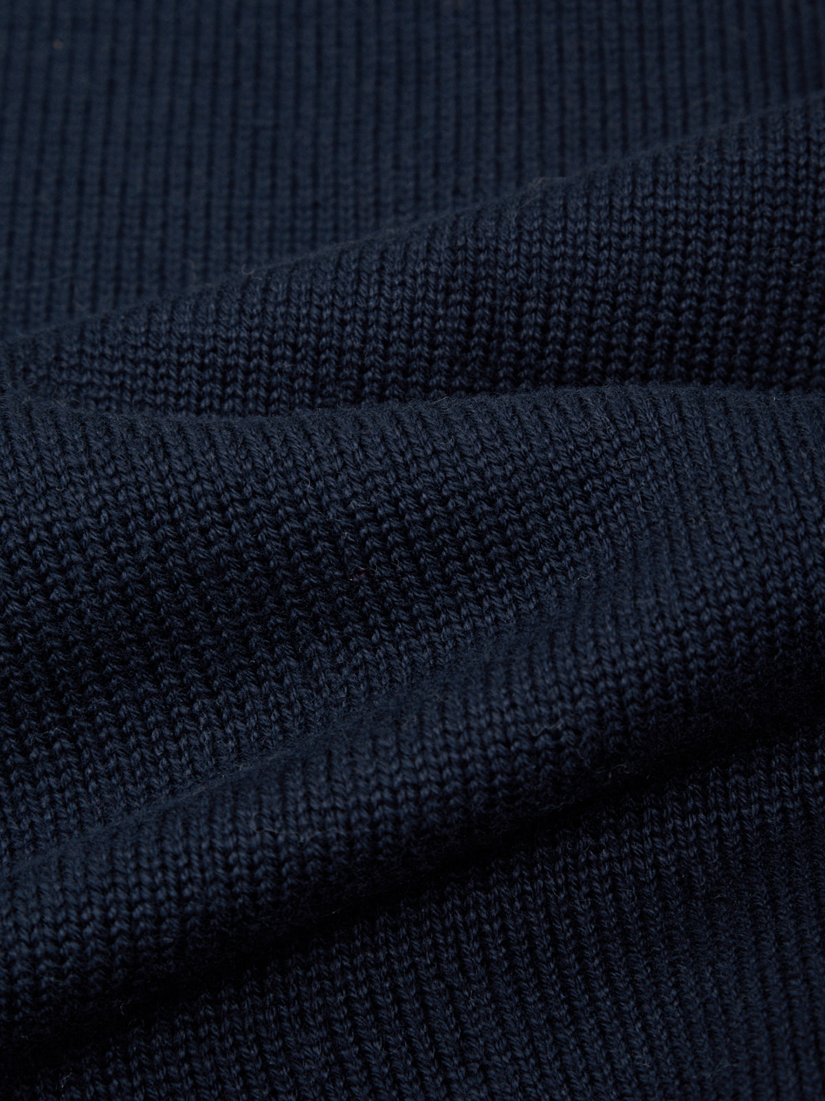 Close-up of dark blue fabric texture
