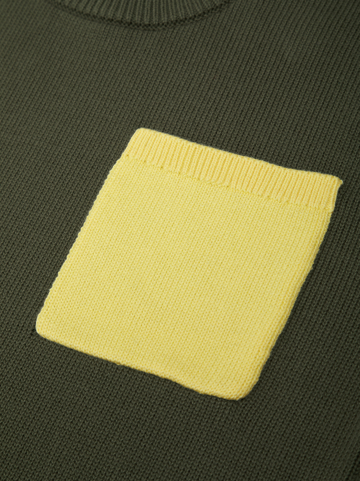 Green sweater with a yellow pocket