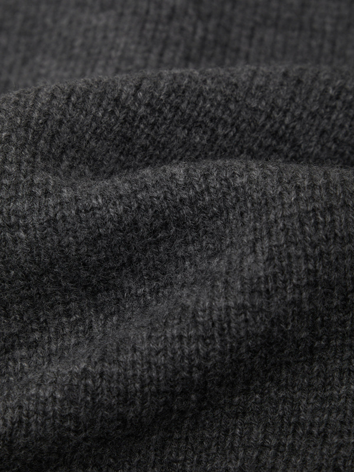 Close-up of dark gray textured fabric