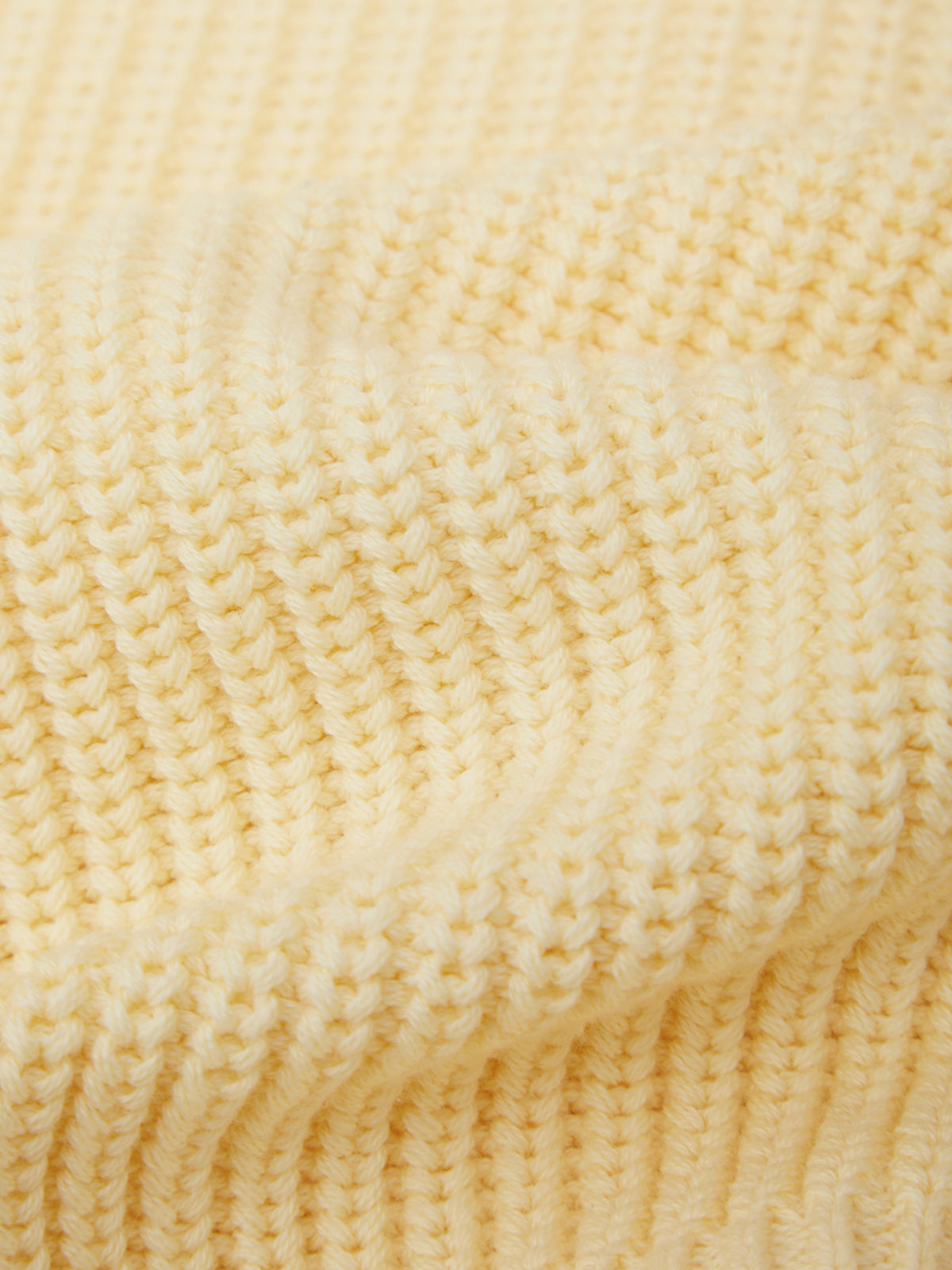 Close-up of a textured yellow fabric