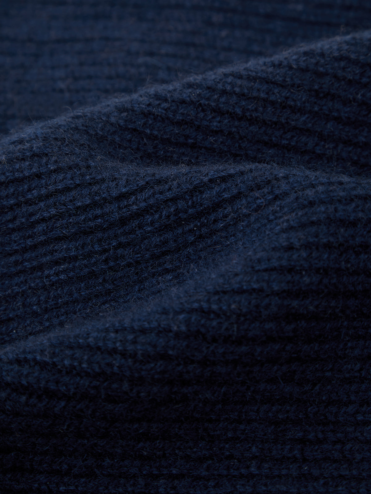 Close-up of textured dark blue fabric