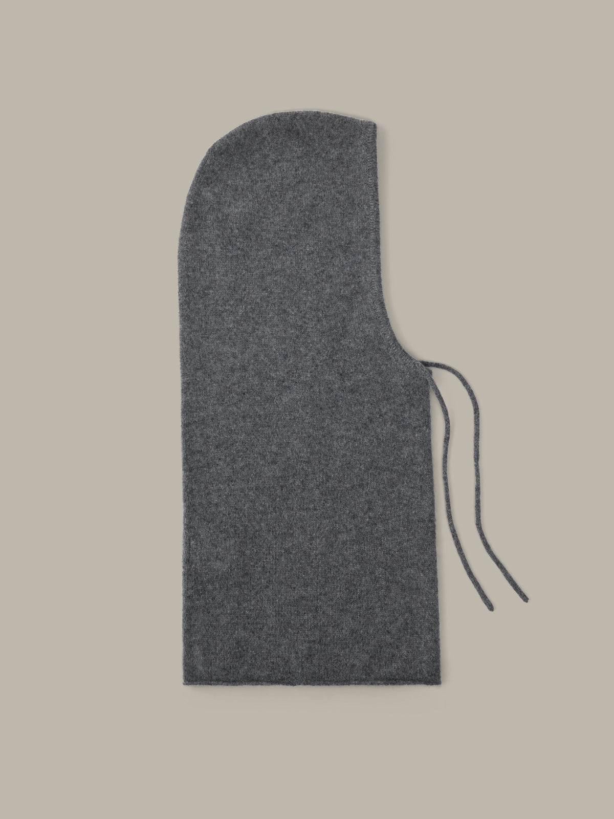 Gray felt hat template on a beige background