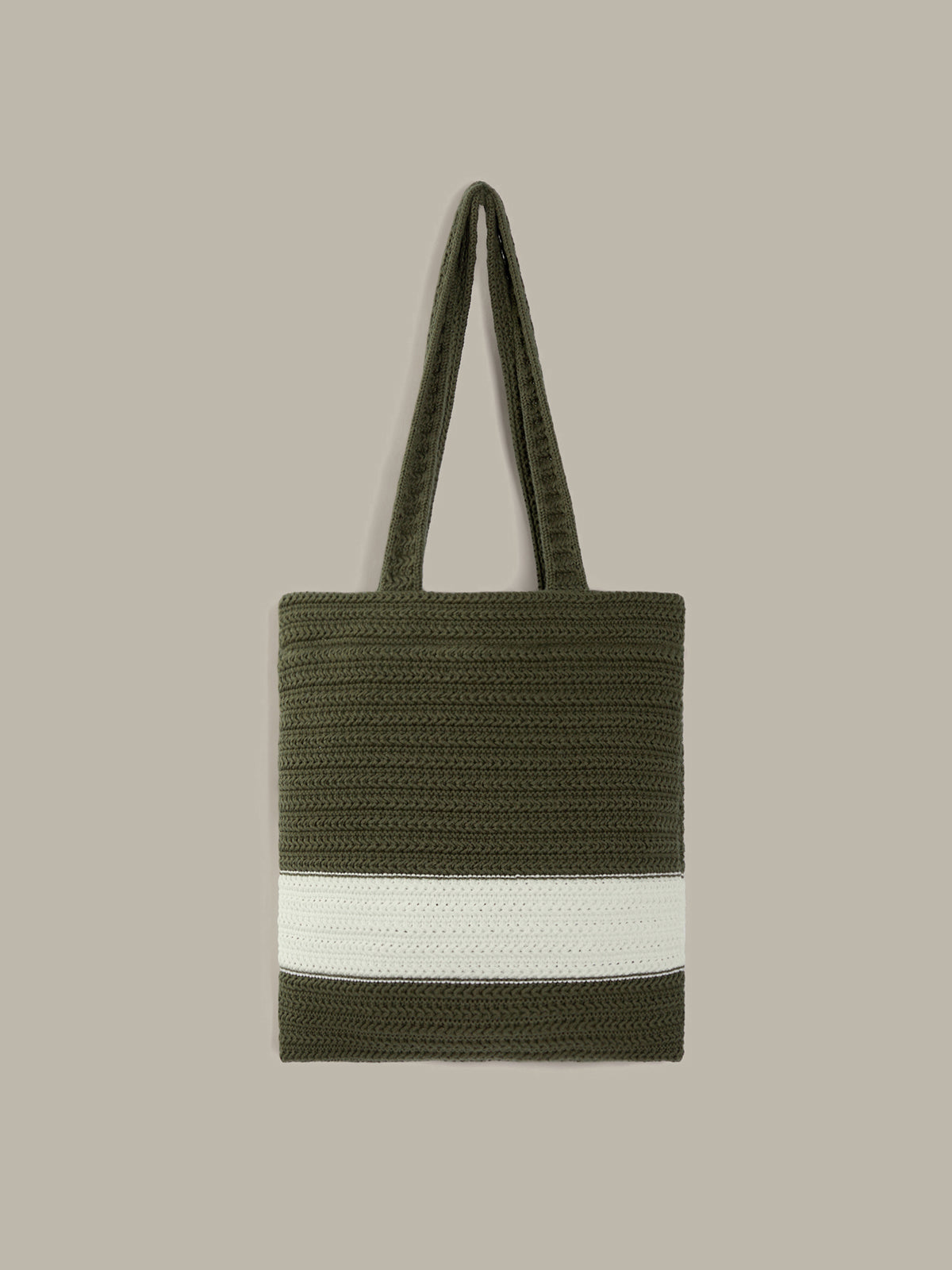 An olive green woven tote bag with a wide white horizontal stripe across the lower half and matching green shoulder straps, shown against a solid taupe background.