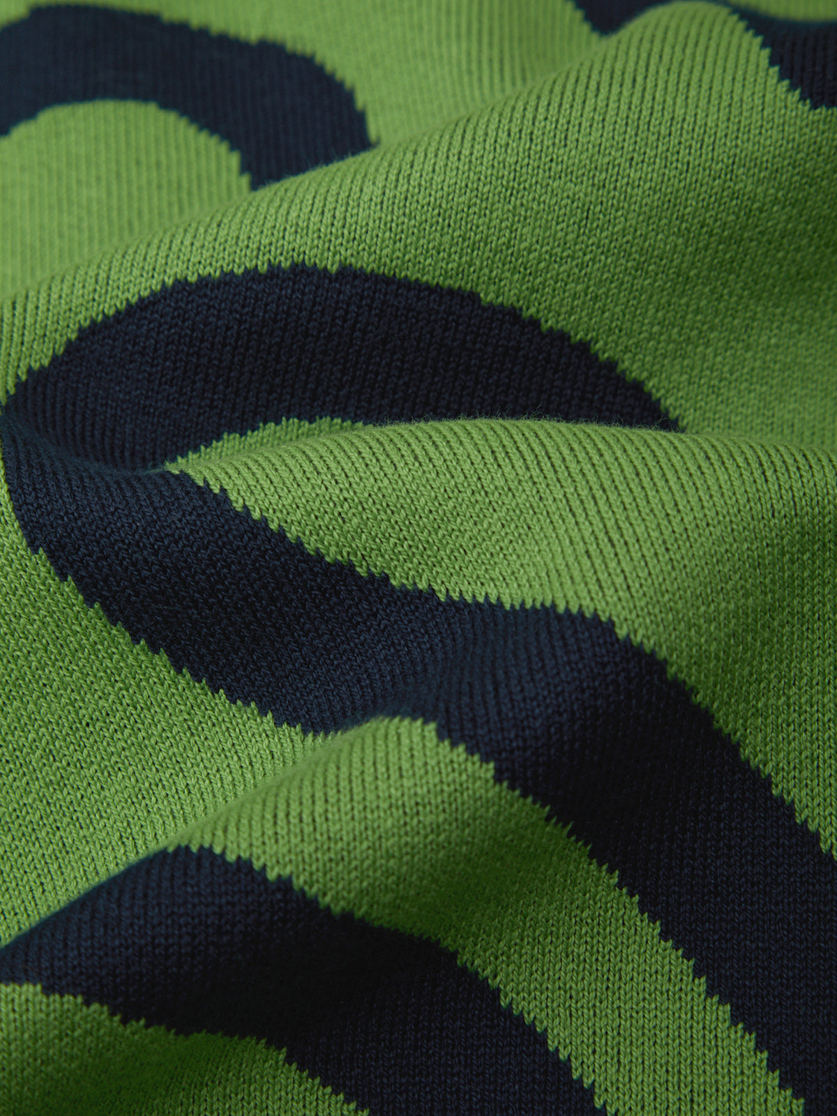 Close-up of green and navy patterned fabric