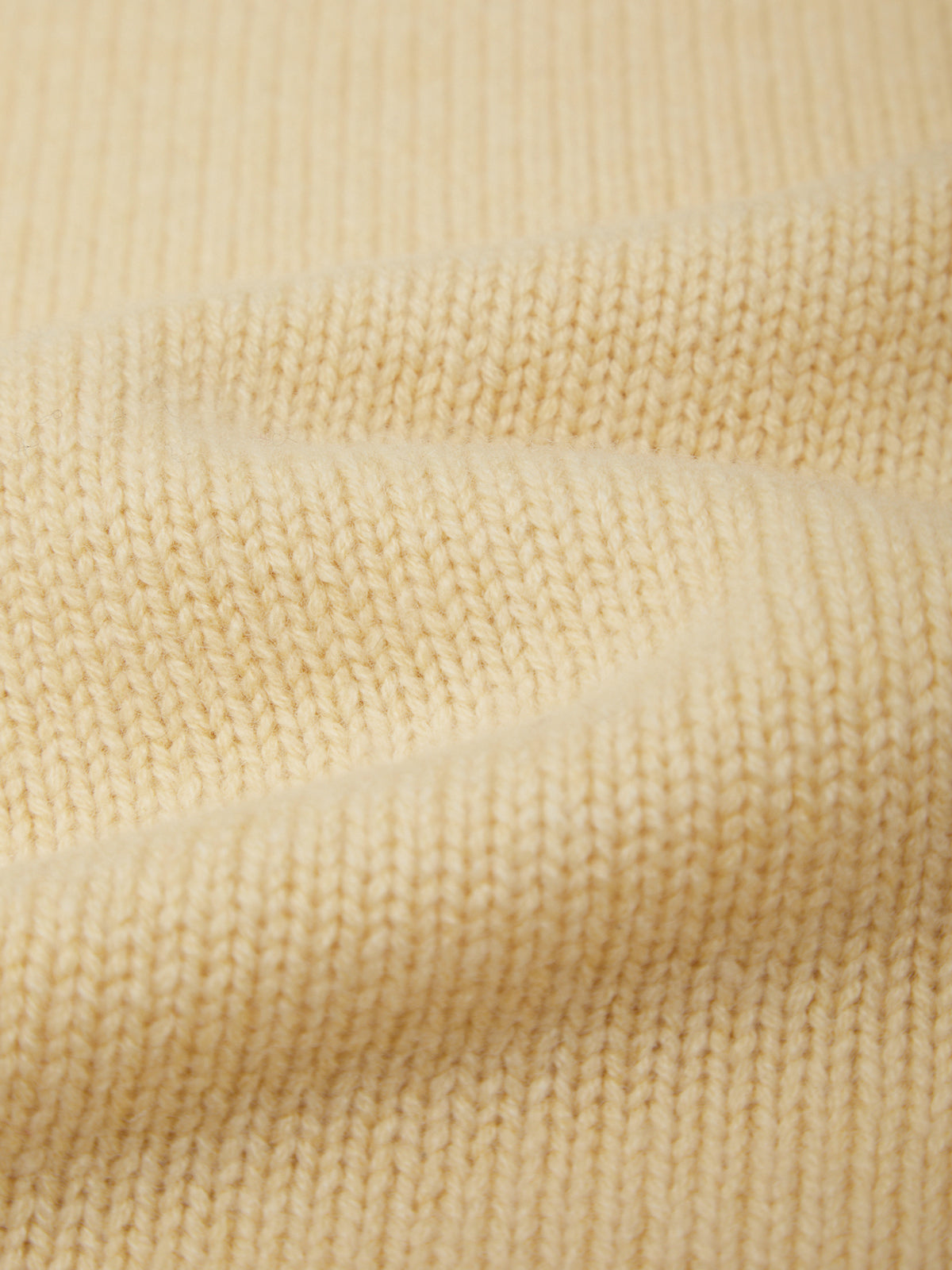 Close-up of beige fabric texture