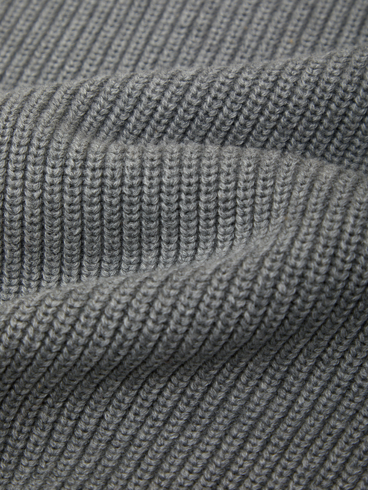 Close-up of gray knitted fabric texture