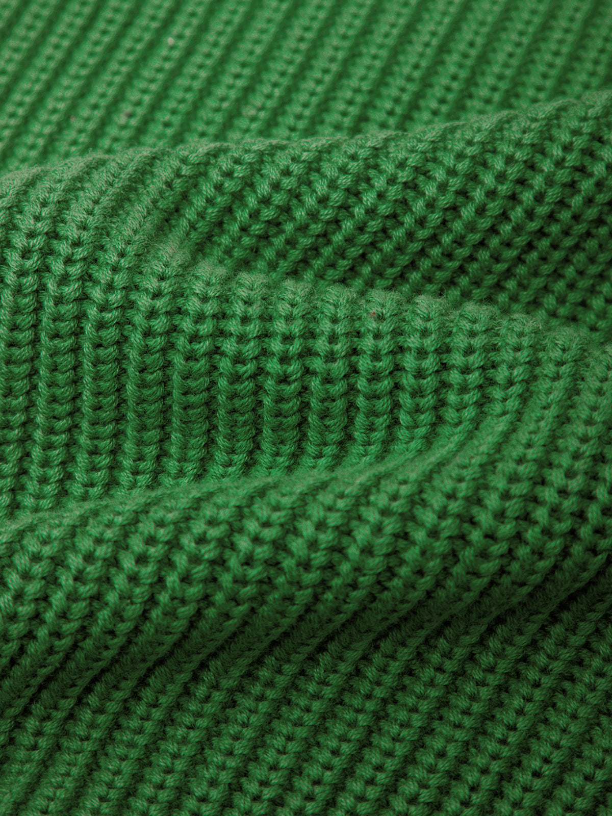 Close-up of green knitted fabric