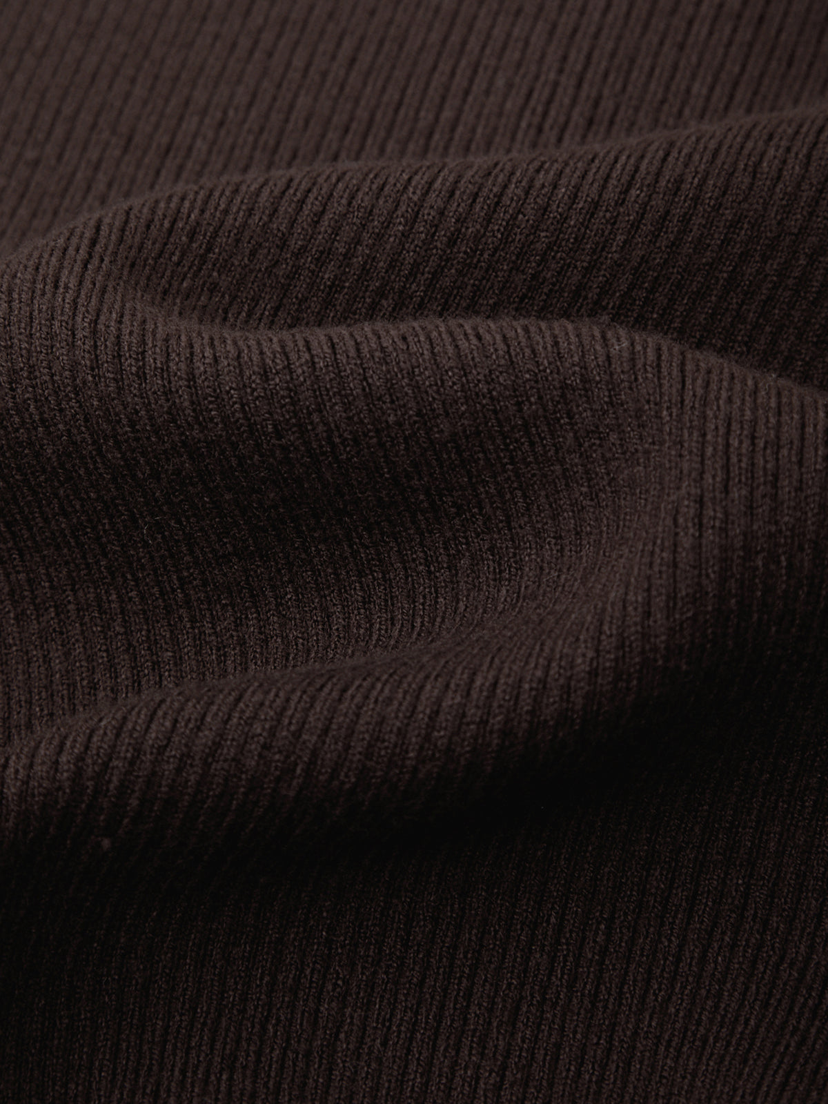 Close-up of dark brown ribbed fabric texture