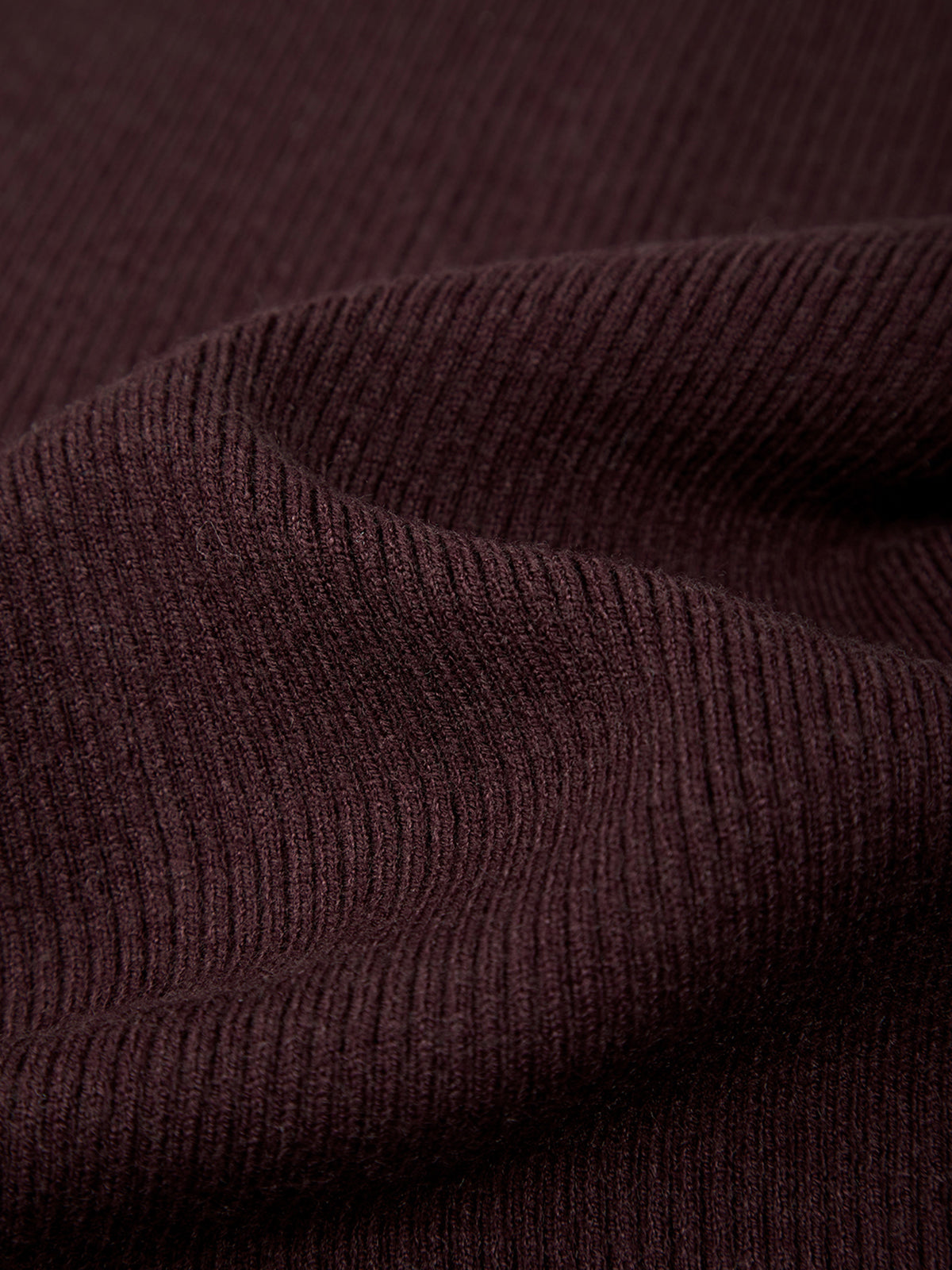 Close-up of wine red textured fabric