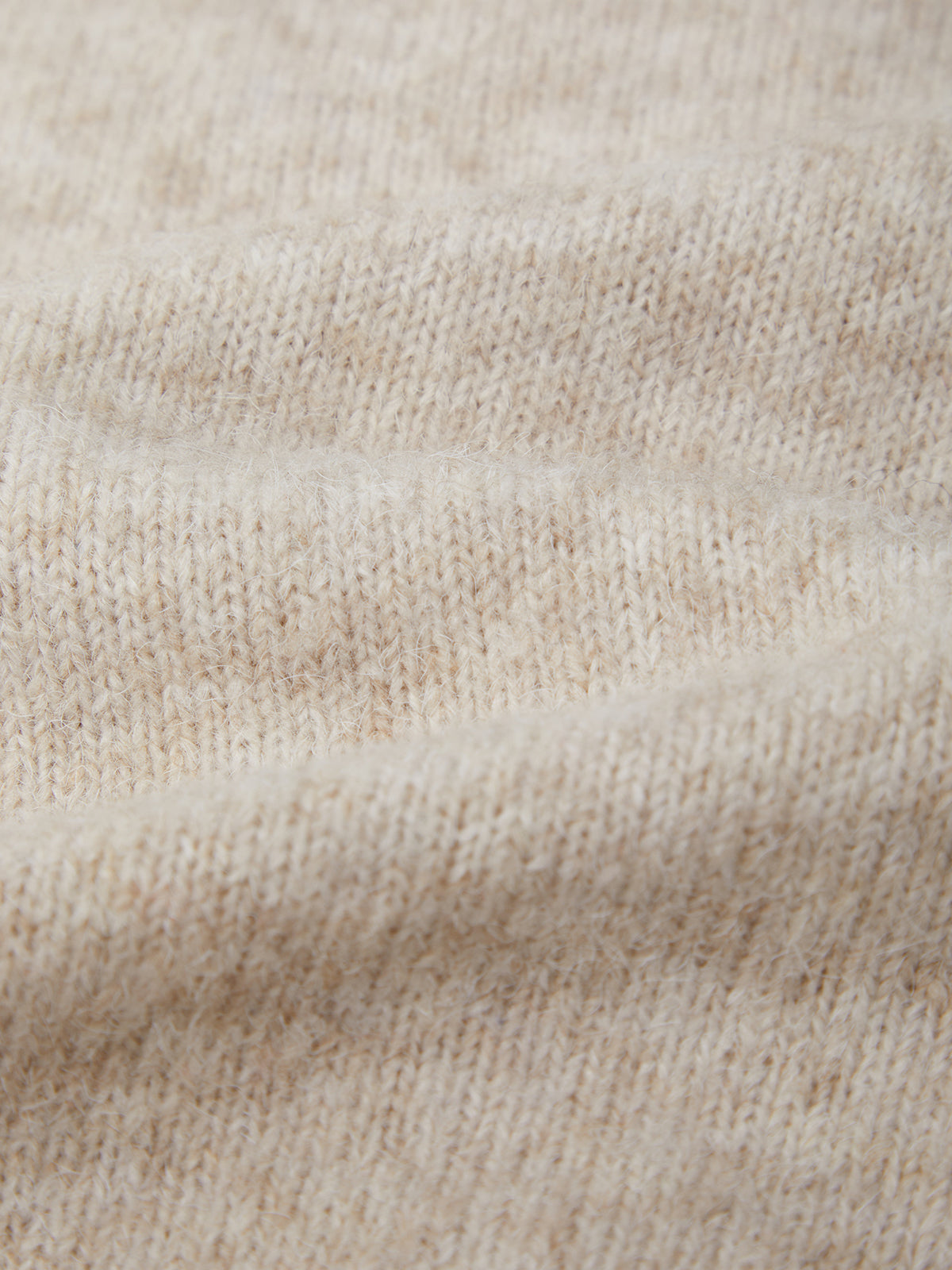 Close-up of beige fabric texture