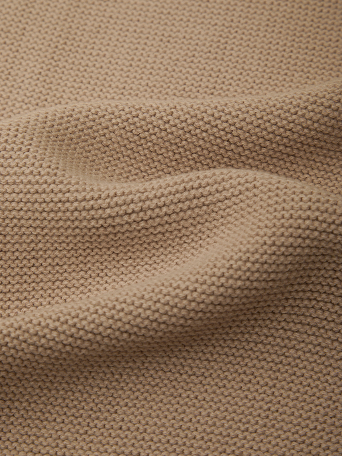 Close-up of brown fabric texture