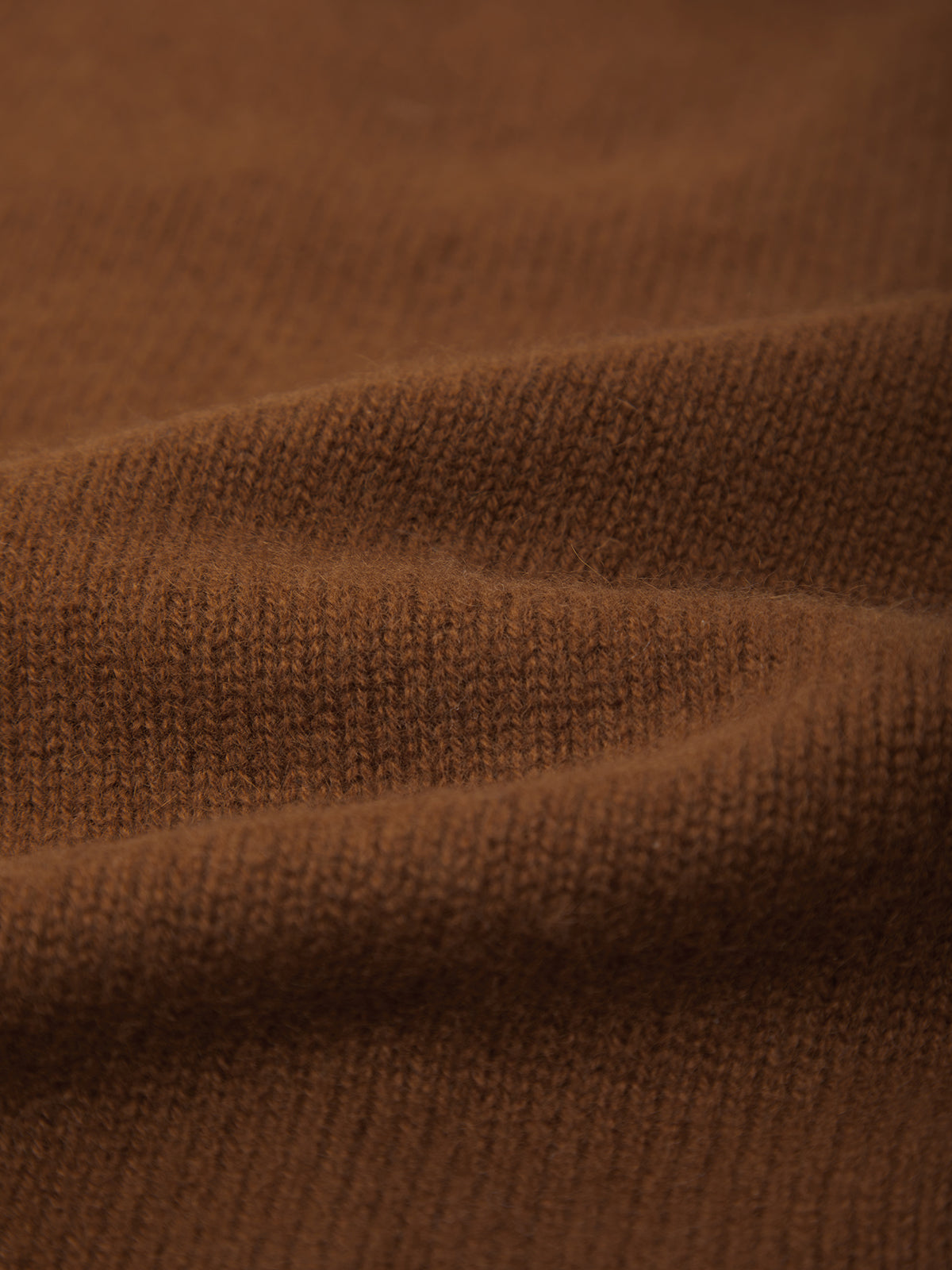 Close-up of brown fabric texture