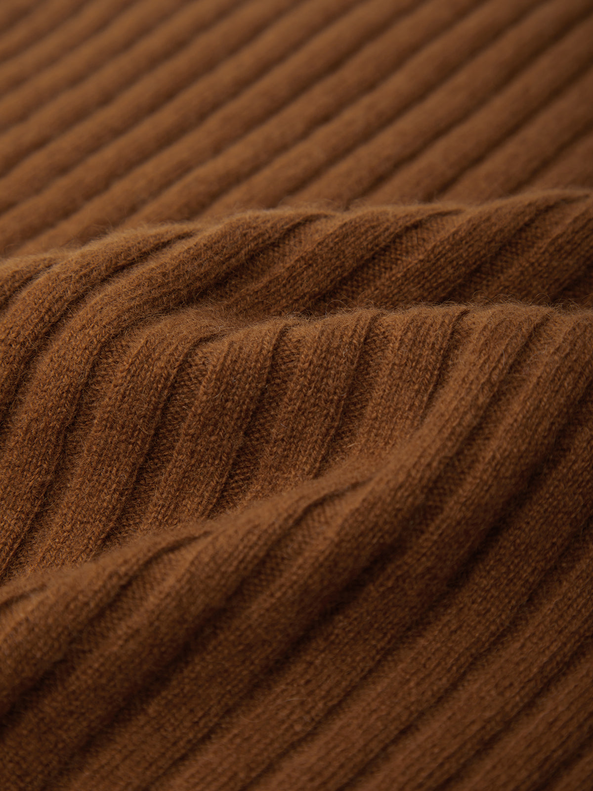 Close-up of brown ribbed fabric texture