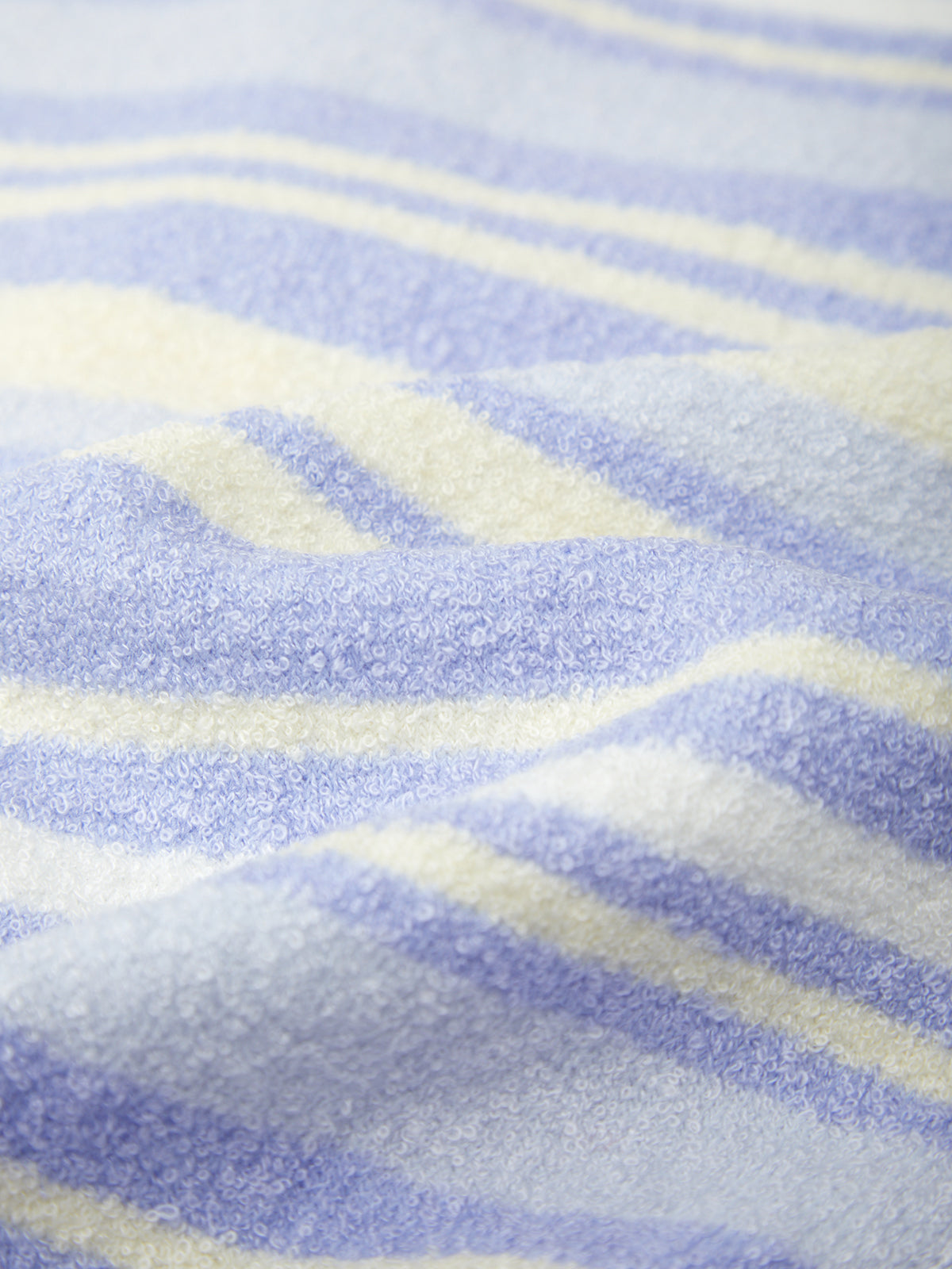 Close-up of blue and yellow striped fabric texture
