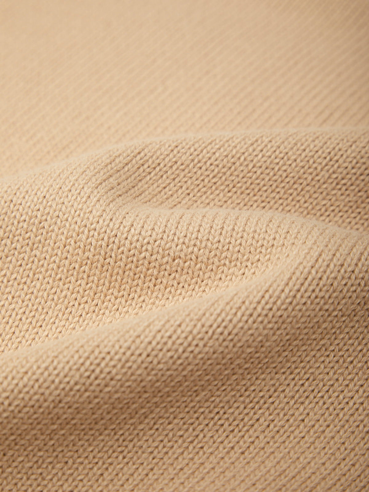 Close-up of beige fabric texture