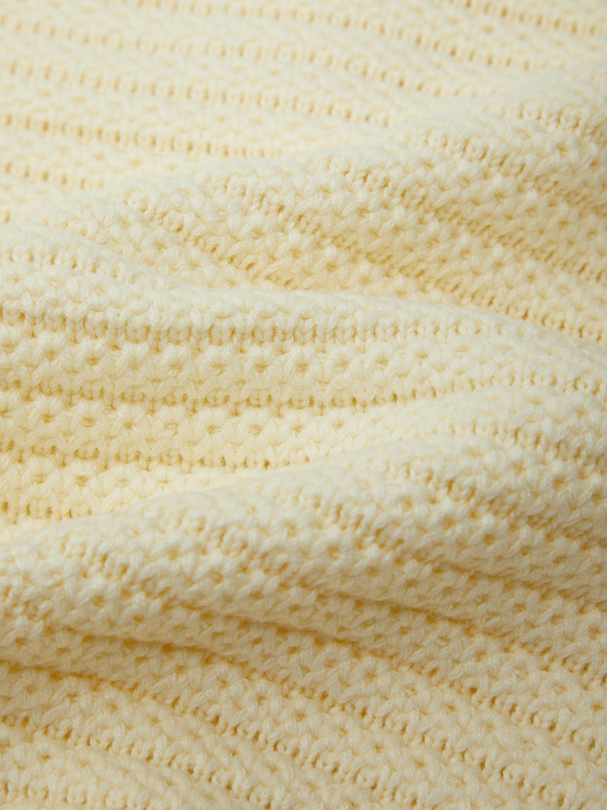 Close-up of textured beige fabric