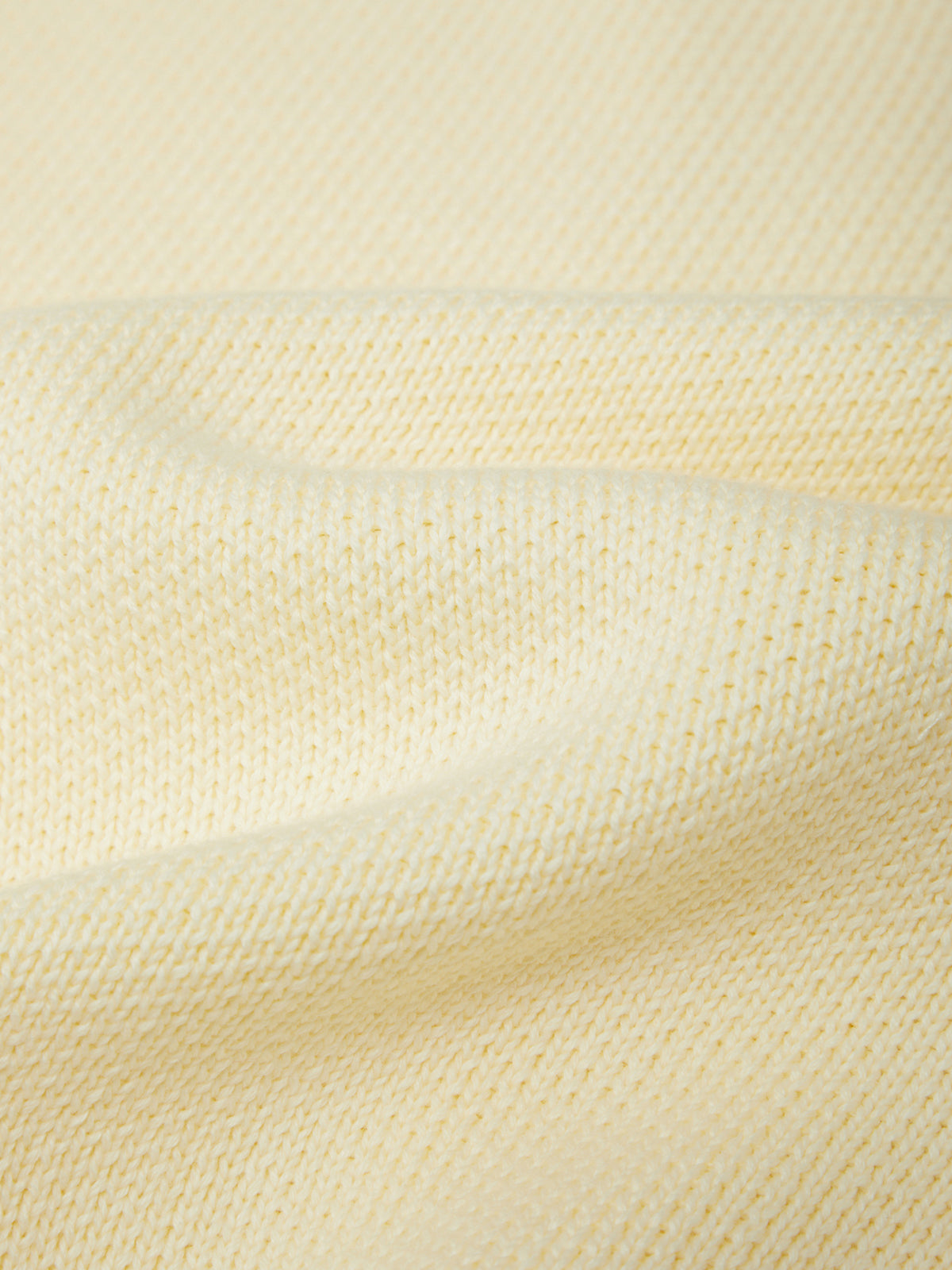 Close-up of beige fabric texture
