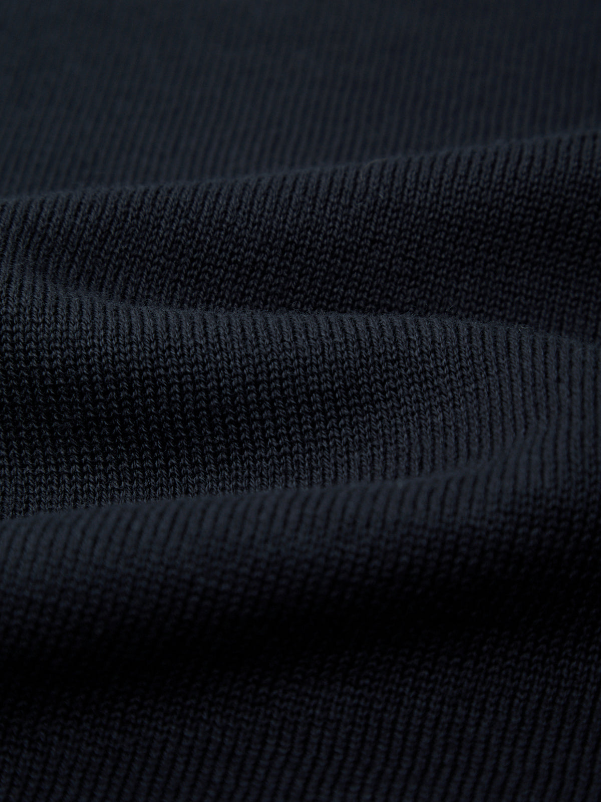 Close-up of dark blue fabric texture
