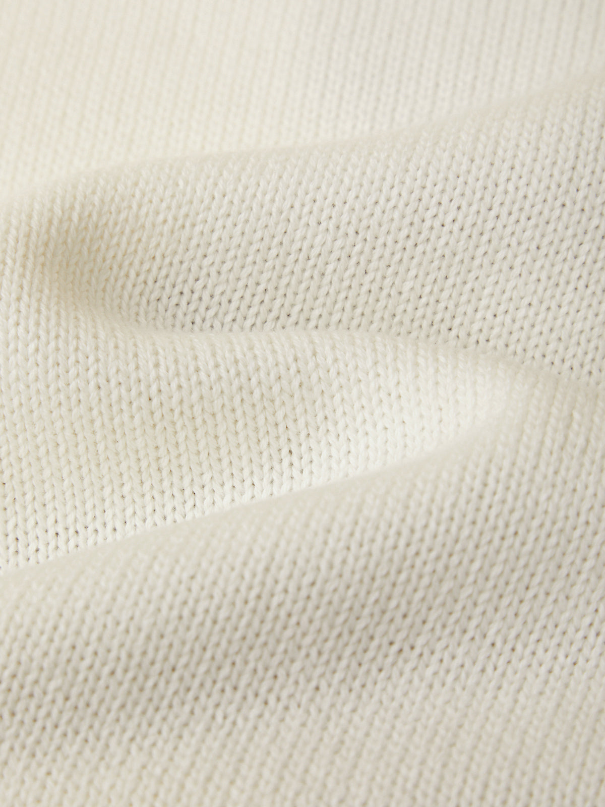 Close-up of beige fabric texture