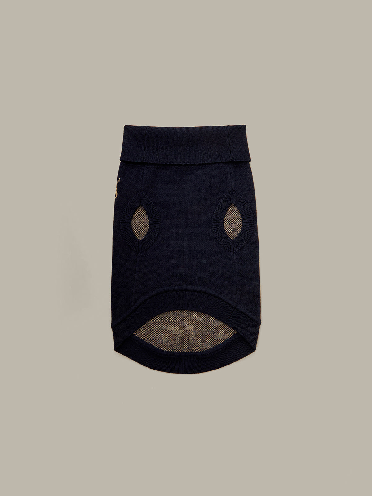 Black pet dress with brown accents on a beige background