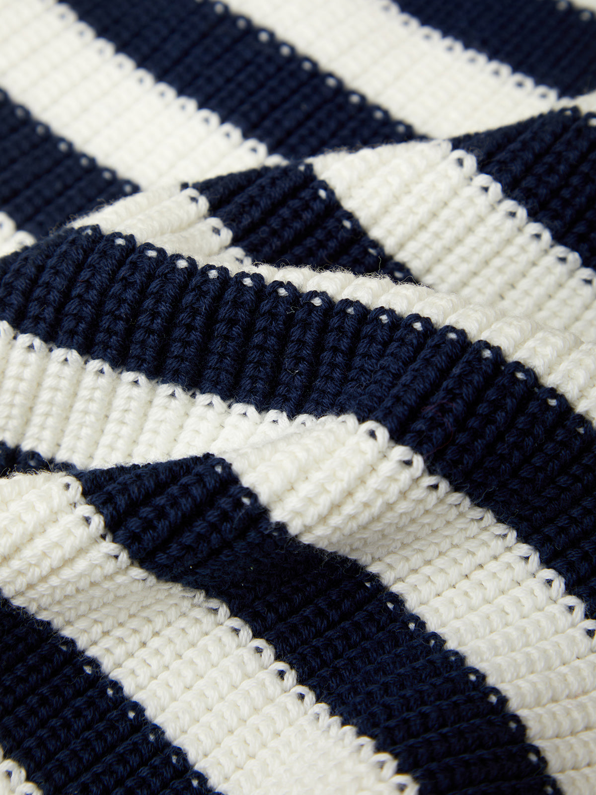 Close-up of a blue and white striped fabric pattern